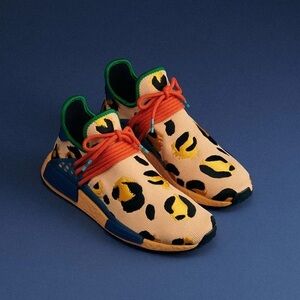 Pharrell x Adidas NMD Hu Animal Print Pulse Amber Sneakers